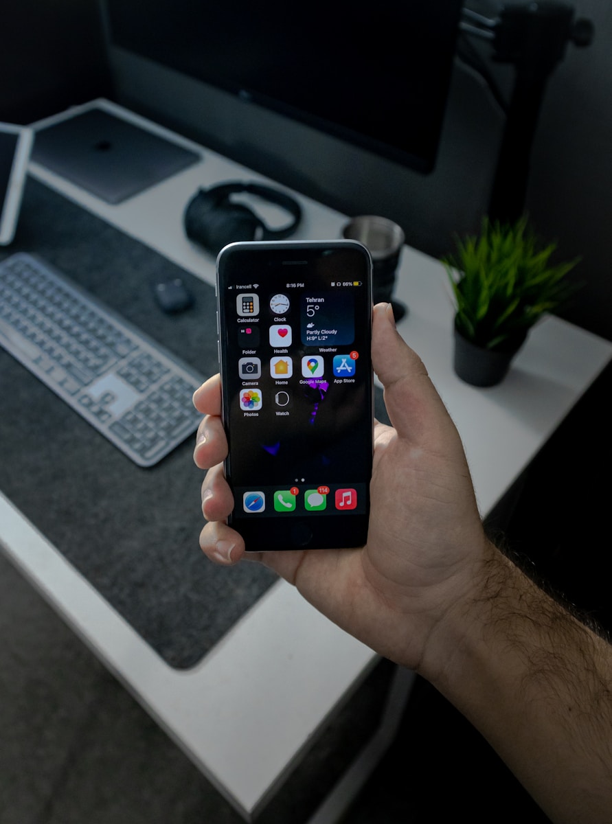 person holding black android smartphone