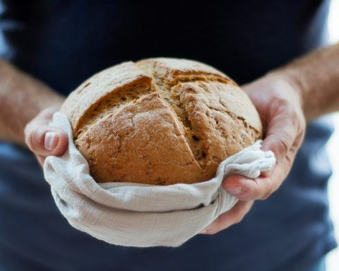 person holding pastry