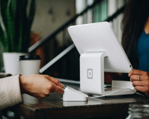 white monitor on desk