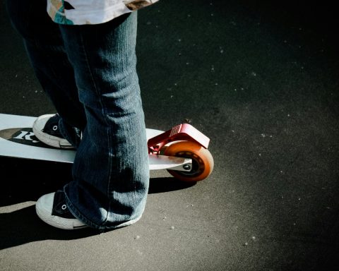 a person riding a skateboard on a street